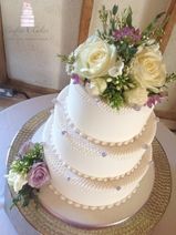 Traditional piped 3 tier wedding cake